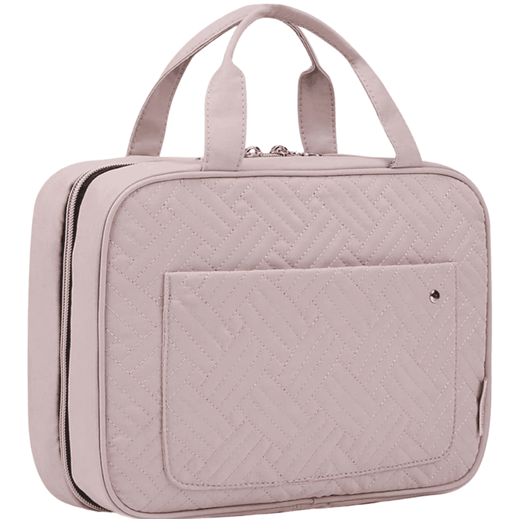 The pink quilted handbag boasts two short handles and a front pocket, perfect for those who appreciate style and practicality. Its zigzag stitching and zipper closure enhance its charm, making it a lightweight choice ideal for casual outings and effortless packing tips.