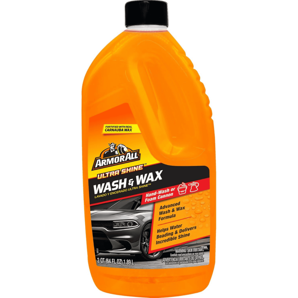 A bottle of Armor All Ultra Shine Wash & Wax, 64 fl. oz., perfect for Tuesday Deals. The orange container features a car image, highlighting its advanced wash & wax formula that aids water beading and provides a hand-wash level of foam, enriched with carnauba wax.