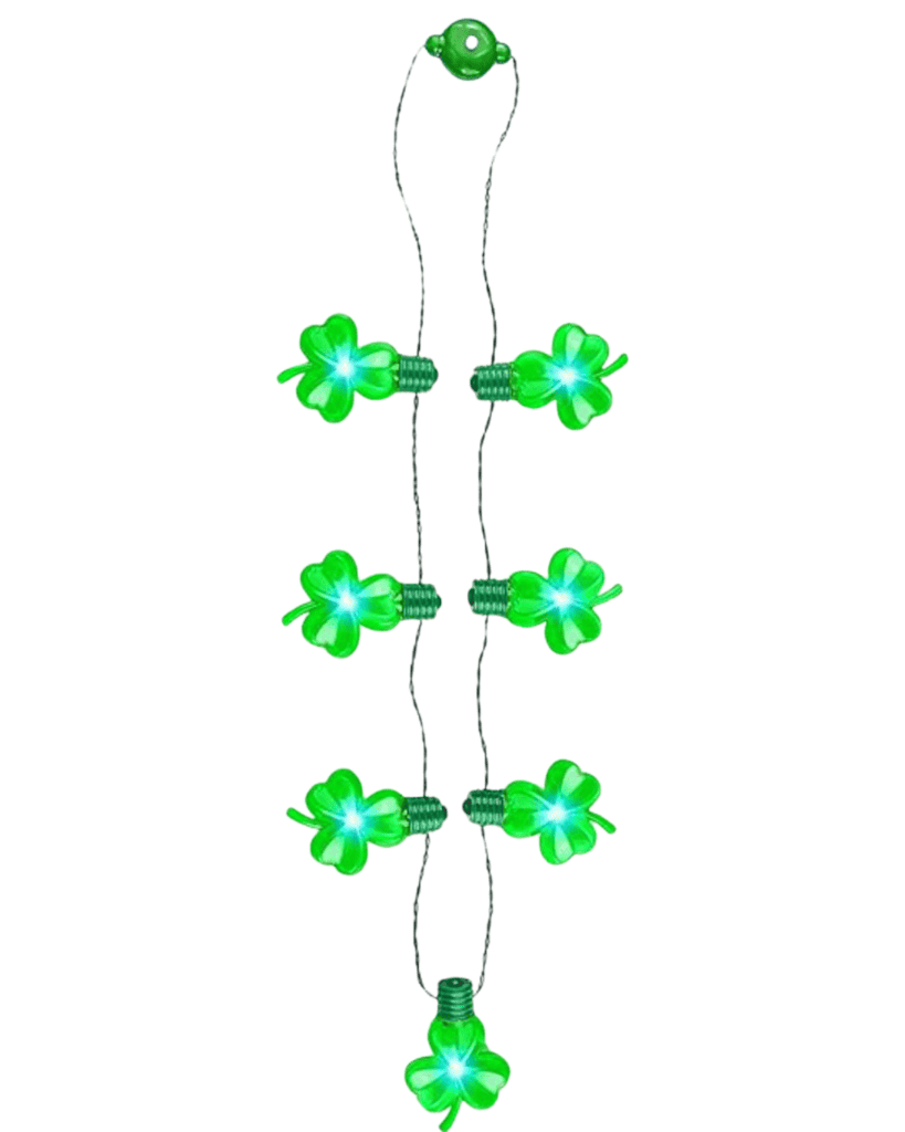 String of green shamrock-shaped LED lights, perfect as St. Patrick's Day accessories, arranged vertically and glowing brightly. The wire is silver with a green battery pack at the top. There are eight shamrocks in total, evenly spaced along the string.